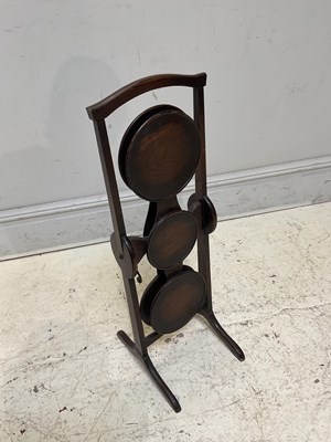 Lot 1171 - A reproduction oak metamorphic cake stand,...