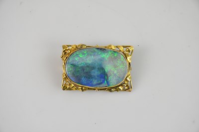 Lot 182 - A yellow metal framed fire opal brooch of...