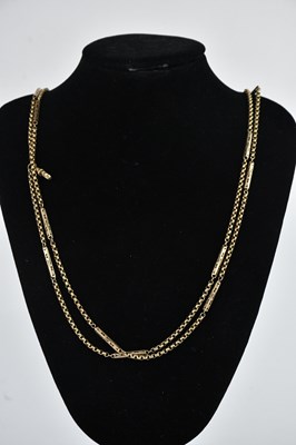 Lot 306 - A yellow metal curb and hollow link belcher...
