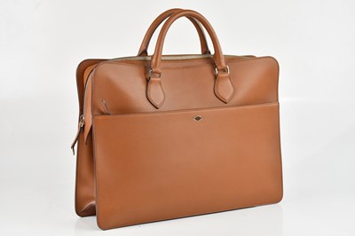 Lot 1204 - CARTIER; a Louis Cartier caramel coloured...