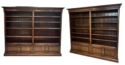 Lot 17 - A large pair of reproduction oak two section...