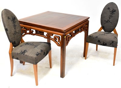 Lot 45 - A modern Chinese hardwood square dining table,...