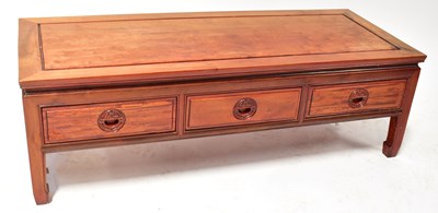Lot 33 - A modern Chinese hardwood coffee table with...