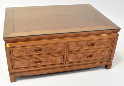 Lot 32 - A modern Chinese hardwood coffee table, with...