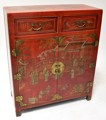 Lot 42 - A modern Chinese red lacquered style cabinet,...