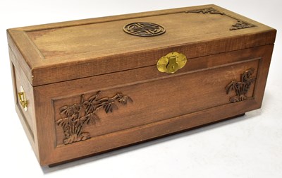 Lot 31 - A modern Chinese camphorwood bedding box, with...