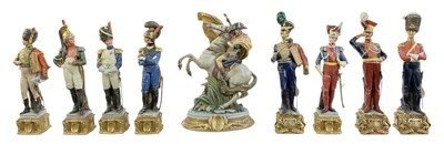 Lot 487 - CAPODIMONTE; a set of nine Napoleonic military...