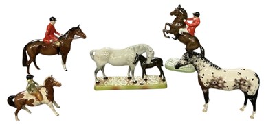 Lot 512 - BESWICK; a porcelain figure of horse and rider,...