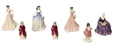 Lot 564 - ROYAL DOULTON; seven porcelain figures of...