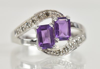 Lot 1292 - A 9ct white gold amethyst and white stone set...