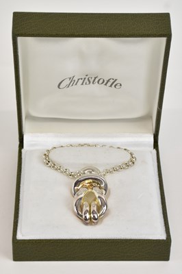 Lot 1431 - CHRISTOFLE; a white metal 'knot' pendant, 4.5...