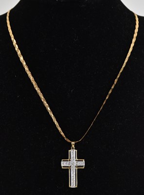 Lot 1343 - A 9ct yellow gold white stone set cross...
