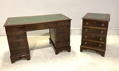 Lot 1025 - A reproduction mahogany pedestal desk, with...