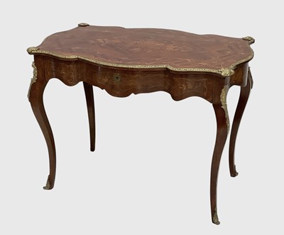 Lot 1007 - A French Louis XV style inlaid kingwood and...