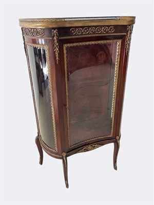 Lot 1009 - A French gilt brass mounted concave fronted...