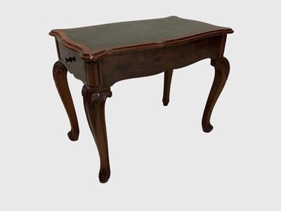 Lot 1033 - A Victorian walnut low library table, with...