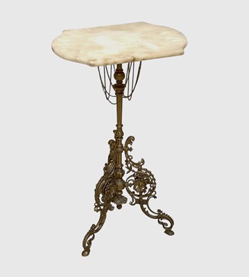Lot 1036 - A Victorian cast brass occasional table, with...