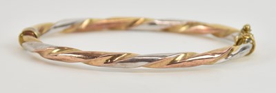 Lot 1416 - A yellow, white and rose metal hinged twist...