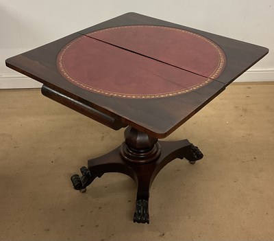 Lot 488 - A Victorian rosewood fold-over table, with a...