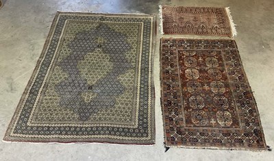 Lot 442 - Three Persian rugs, largest 200 x 138cm.