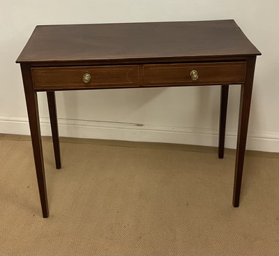 Lot 496 - A mahogany single drawer side table, raised on...