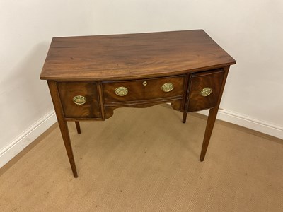 Lot 503 - An early 19th century mahogany bowfronted...