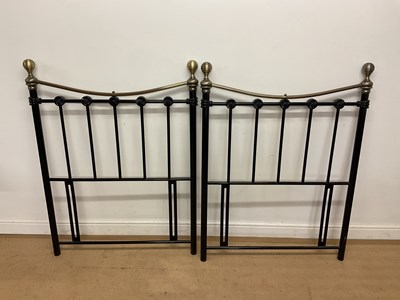 Lot 569 - A modern pair of brass and aluminium single...