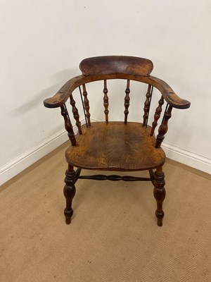 Lot 501 - A late 19th century ash and elm captain's bow...