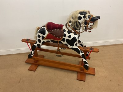 Lot 56 - A recently refurbished rocking horse,...