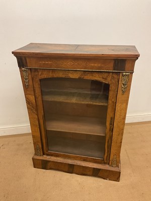 Lot 481 - A walnut cabinet with brass banding to top and...