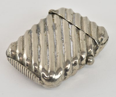 Lot 1190 - An early 20th century white metal vesta case,...