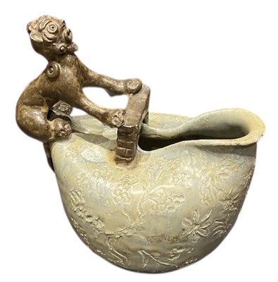 Lot 535 - A studio pottery jug, with flared rim and...