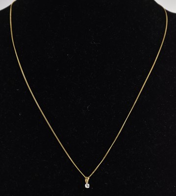 Lot 1342 - A 9ct yellow gold diamond set drop pendant,...