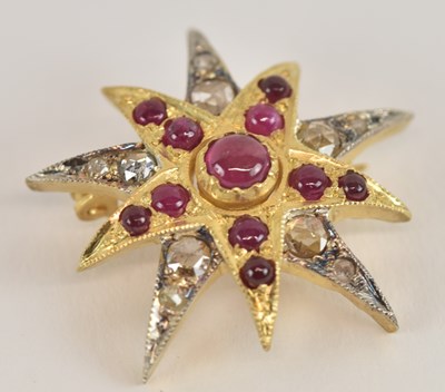 Lot 1390 - A 925 silver gilt cabochon ruby and diamond...