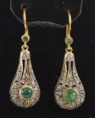 Lot 1365 - A pair of 925 silver gilt emerald and diamond...