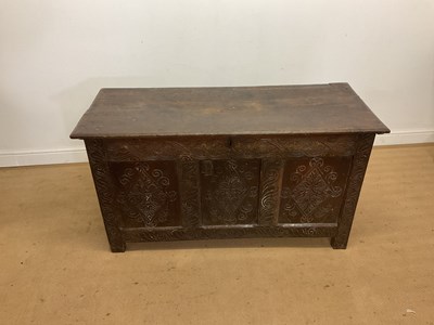 Lot 492 - A 18th century oak coffer with decorative...