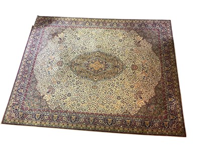 Lot 694 - WILTON; a woven Persian style rug, with damage...