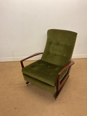 Lot 480 - PARKER KNOLL; a 1960s button back recliner on...