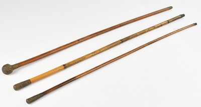 Lot 579 - Three bamboo shafted military swagger sticks...
