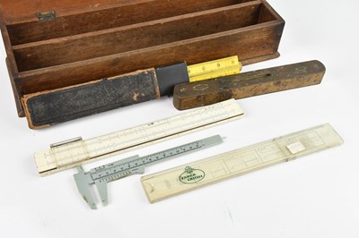 Lot 1296 - A collection of rules including a folding...