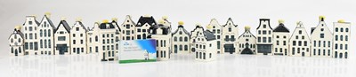 Lot 243 - BLUE DELFT FOR KLM; a collection of houses,...