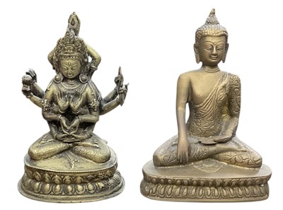 Lot 1031 - An early 20th century Indian brass figure of...