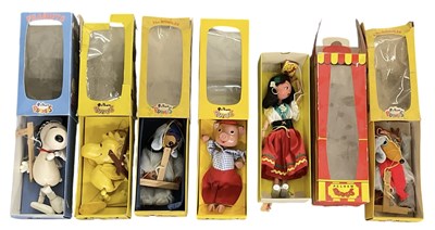 Lot 426 - PELHAM PUPPETS; a boxed Peanuts puppet, boxed...