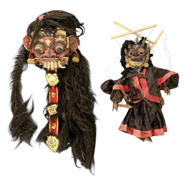 Lot 1079 - A Balinese Rangda mask and a further Balinese...