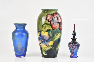 Lot 19 - WALTER MOORCROFT; a cylindrical vase decorated...