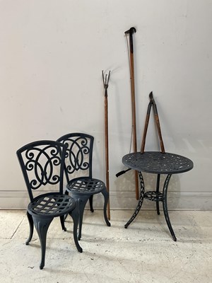 Lot 1245 - A pair of black painted aluminium garden...