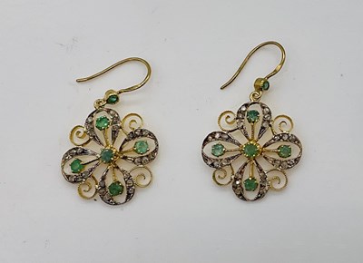 Lot 497 - A pair of silver and silver gilt rose cut...