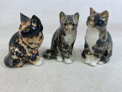 Lot 185 - WINSTANLEY POTTERY; three tortoiseshell cat...