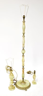 Lot 107 - Three green onyx lamps comprising a standard...
