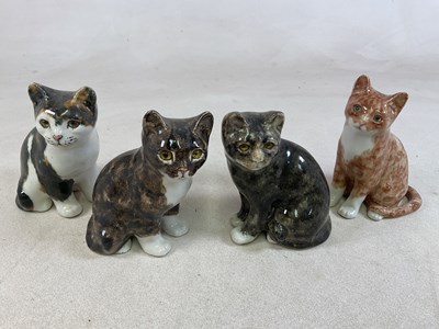 Lot 186 - WINSTANLEY POTTERY; four cat models in seated...